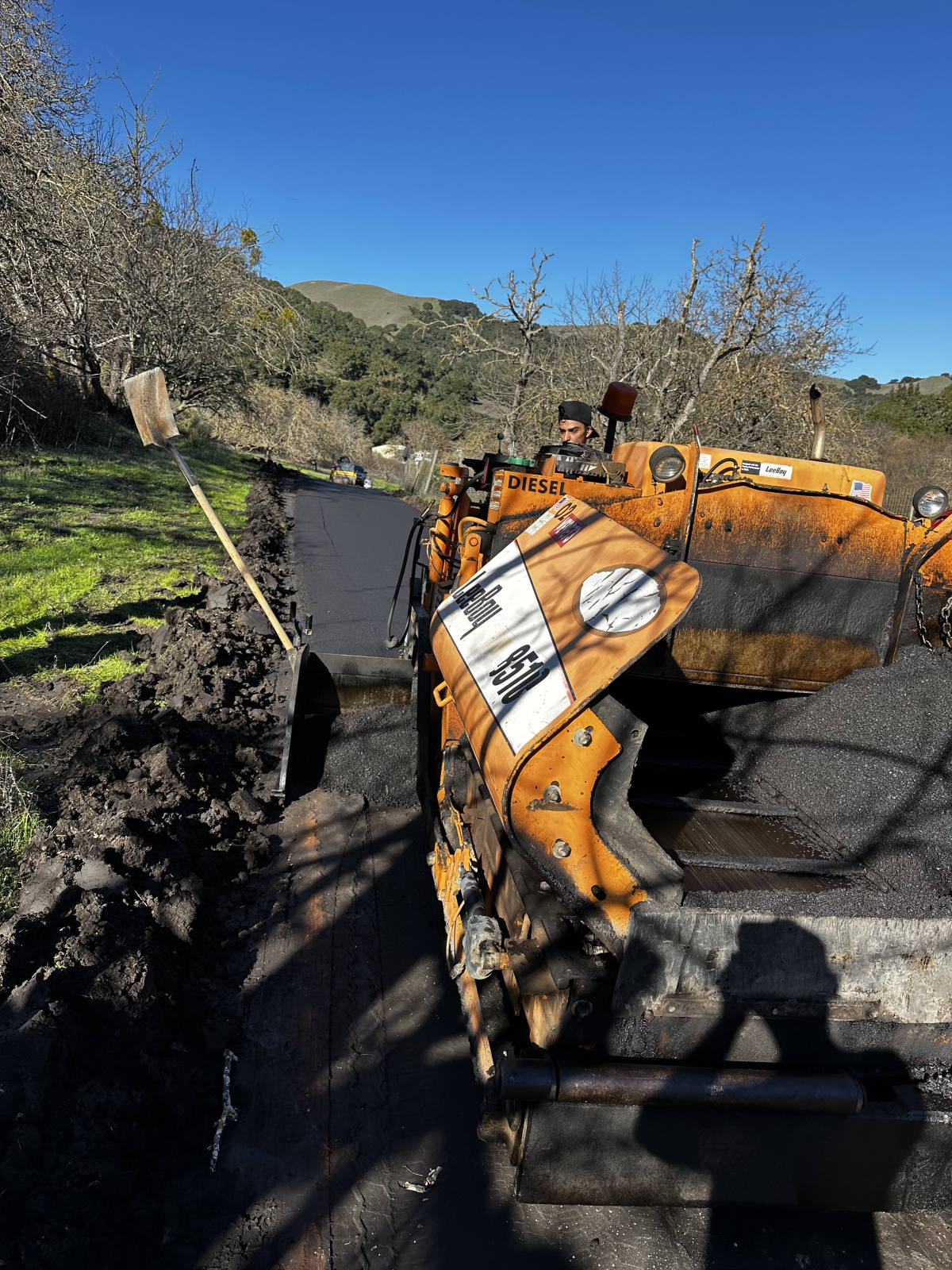 Asphalt Paver Laying Hot Mix completed by North State Paving in San Jose